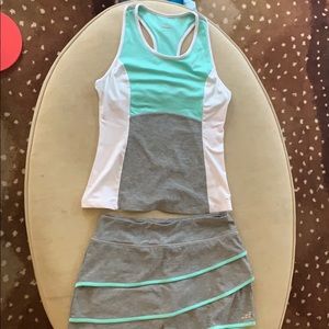 Tennis outfit size M . Worn once Grey and Teal
